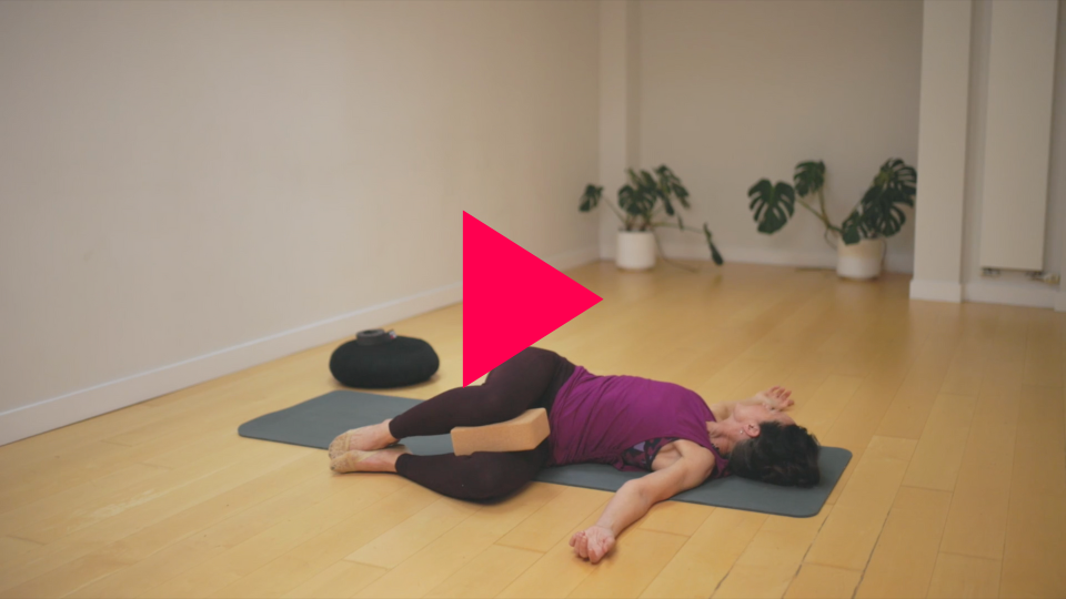 Premium Photo | Relaxed woman lying on mat in child yoga pose while  training online via mobile phone